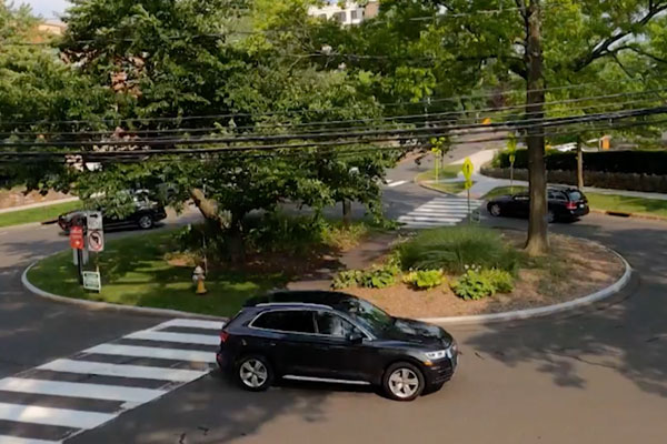 black car in a roundabout