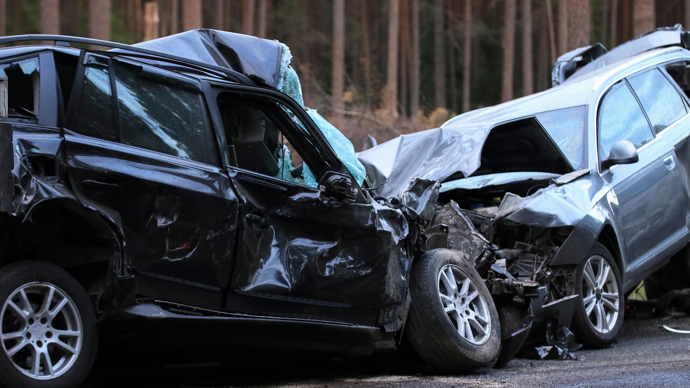 2 cars that have had a very bad crash