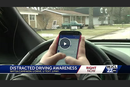 driver texting and driving at the same time